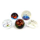 Five glass paperweights, comprising Caithness Robin and Kettle 217/1000, Selkirk Glass White Water D