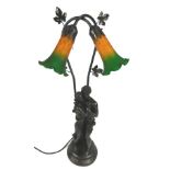 A 1960s Tiffany style spelter table lamp, with arched tulip shades, in yellow and green colouring, t