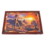 A Bradford Exchange John Wayne True Spirit of the West illuminated stained glass panorama, with cert