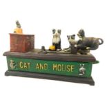 A reproduction cast metal cat and mouse money bank, 19cm wide.