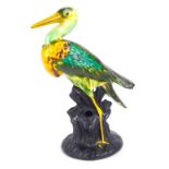 A Royal Staffordshire pottery heron figure, on a black painted base, 18cm high.