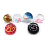 Six medium glass paperweights, comprising Caithness Halley's Comet 130/50, Caithness Reflections, mi