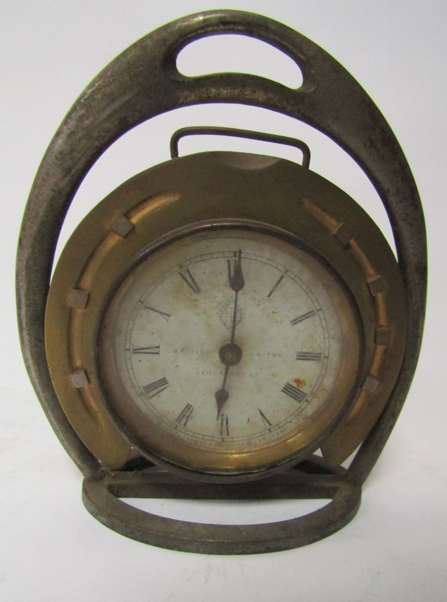 Three novelty clock stands, formed from a stirrup with horseshoe mount, one including clock face sta - Image 3 of 5