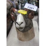 A Quail pottery jug modelled as a goat, 12cm high.