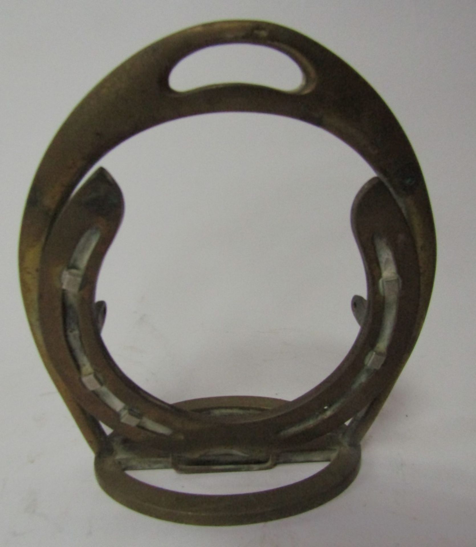 Three novelty clock stands, formed from a stirrup with horseshoe mount, one including clock face sta - Image 5 of 5