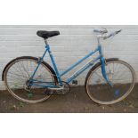 A Norman Ashford England lady's blue bicycle.