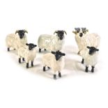 Six Beswick sheep, comprising ram, two sheep and three lambs.