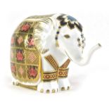 A Royal Crown Derby Imari elephant paperweight, with gold hexagonal stopper, 11cm high.