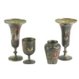 A pair of Indian silvered metal and enamel style trumpet shaped vases, 23cm high, a similar goblet,