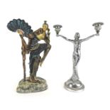 A chrome plated Art Deco style two branch candelabra, with figural column and domed foot, 35cm high,