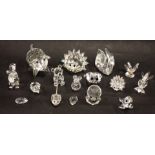 A collection of Swarovski crystal and other animal ornaments, comprising hedgehogs, frogs, mouse, co