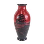 A Royal Doulton Flambe vase, decorated with a rural scene of cottage, etc., printed mark in black an