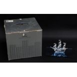 A Swarovski crystal ship, with stand, 11cm high. (boxed)