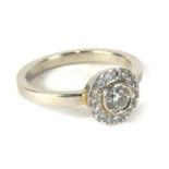 A David Fowkes of Lincoln platinum diamond dress ring, with round brilliant cut centre stone approx