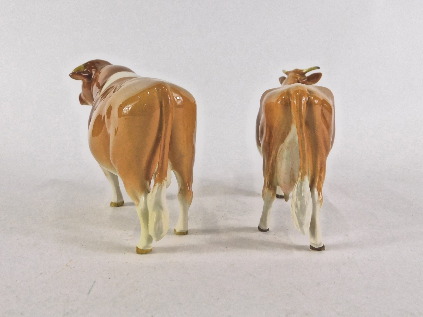 Two Beswick cattle, comprising a CH Sabrina's Sir Richmond 14th Guernsey bull and a cow, 11cm high. - Image 3 of 5