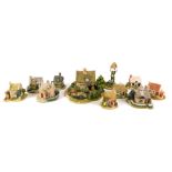A group of Lilliput Lane cottages, comprising Oak Cottage, The Gingerbread Shop, Holly Tree House, C