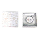 A Royal Mint Beatrix Potter Tailor of Gloucester silver proof fifty pence, no. 18897, boxed in outer