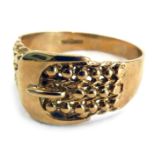 A 9ct gold buckle ring, the central buckle on three strand ball design, with outer twist border, rin