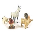 Five Beswick animal ornaments, comprising robin on perch, Charolais calf, black spotted pig, a Jerse