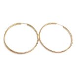 A pair of hoop earrings, yellow metal stamped 375, 6cm diameter, 8.7g.