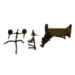 Architectural wares, comprising a gothic wrought iron candelabra, meat hanging rack and swing seat.