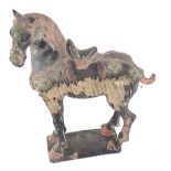 A Chinese Tang horse, mainly black in colour with orange, green detail on a rectangular base, 32cm h