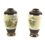 A pair of Castle China Satsuma vases, each decorated with Mount Fuji within a river landscape, print