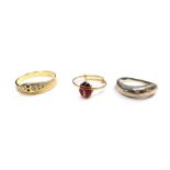 Three dress rings, comprising an 18ct gold snake diamond and sapphire dress ring, ring size N, a cos