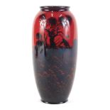 A Royal Doulton Flambe bullet shaped vase, decorated in silhouette, etc., with a ploughing scene, pr