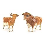 Two Beswick cattle, comprising a CH Sabrina's Sir Richmond 14th Guernsey bull and a cow, 11cm high.