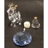 Three Swarovski crystal Christmas ornaments, comprising reindeer 7cm high, blue crystal bauble 8cm h