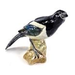 A Beswick magpie, number 2305 on perch, 13cm high.