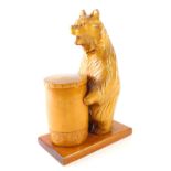 A carved wooden Russian bear pot, with removable lid, 26cm high.