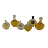 Six bottles of perfume, comprising a Eau de toilette Worth, partially used, and an empty bottle, Mis