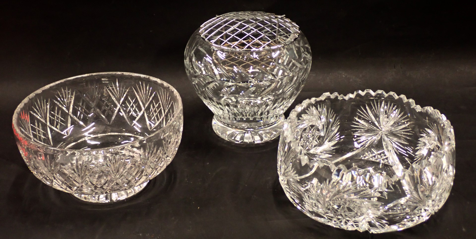 Three cut crystal glass bowls, comprising fanned fruit bowl, 20cm wide, pleated rim bowl, 20cm wide,