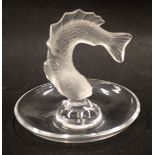 A Lalique glass pin dish, the central animal with fish, opalescent design, on clear base, signed, 9c