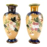 A near pair of Doulton Lambeth Slaters Patent vases, one stamped EP for Emily Partington, 31cm high.
