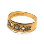 A 15ct gold Victorian gypsy ring, set with tiny diamonds and cultured pearls, one stone missing, rin