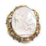 A 19thC shell cameo brooch, the central cameo with raised and carved relief figures of warriors and
