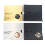 A 007 James Bond coin collection, enclosing the Bond James Bond Shaken not Stirred and Pay Attention