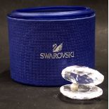 A Swarovski crystal clam shell with pearl, boxed.