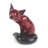 A Royal Doulton Flambe model of a seated fox, printed mark in black to underside, 24cm high.