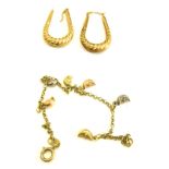 A group of 9ct gold and other jewellery, comprising a pair of 9ct gold hoops, and a 9ct gold moon fa
