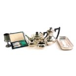 A silver plated Viners four piece tea set, with ebonised handles, etc.