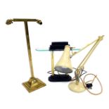 Three vintage lamps, comprising a cream Anglepoise desk lamp, 51cm high, a brass two branch table la