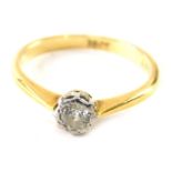 An 18ct gold diamond solitaire ring, size N.