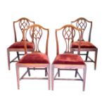 A set of four 19thC mahogany dining chairs, each with a pierced vase shaped splat, a drop in seat, o