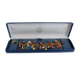 A Bradford Exchange Disney charm bracelet, with enamelled characters to include Winnie the Pooh and