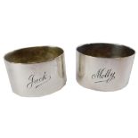 Two Edward VII silver napkin rings, each of plain design, inscribed Jack and Molly, Sheffield 1901 a