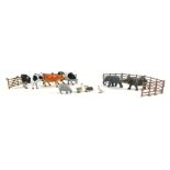 A collection of Britains and other lead animals, to include rhino, cows, elephant, and various fence